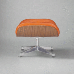 Side view of Charles Eames Ottoman in Camel Brown Leather with Walnut Wood