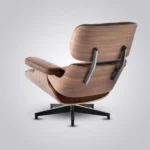 Close-up of the swivel base and rubber shock mounts on the brown leather armchair