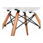 Back view of the white moulded DSW side chair on wooden dowel base