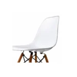White Eames DSW dining chairs styled around a dining table