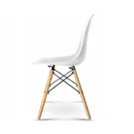 White Eames DSW dining chairs styled around a dining table