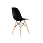 Close-up of beech dowel legs and lacquered steel bracing on the DSW chair