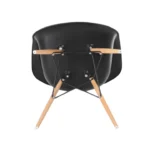Black Eames DAW arm chair styled in a contemporary dining room