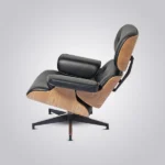 Lounge chair Charles Eames design in blonde ashwood with black leather, black base and matching ottoman