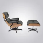 Side view of the black leather ashwood lounge chair showing the fixed 15 degree recline