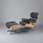 Back view of the blonde ashwood veneer shell on the black leather chair