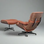 Tan mid century chair and ottoman in a sunlit corner with plants and linen curtains