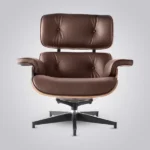 Side view of the brown leather walnut armchair showing the reclined seat and ottoman