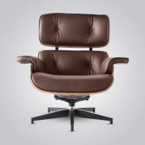 Side view of the brown leather walnut armchair showing the reclined seat and ottoman