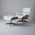 White leather lounge chair with walnut shell and matching ottoman from the lounge chairs collection